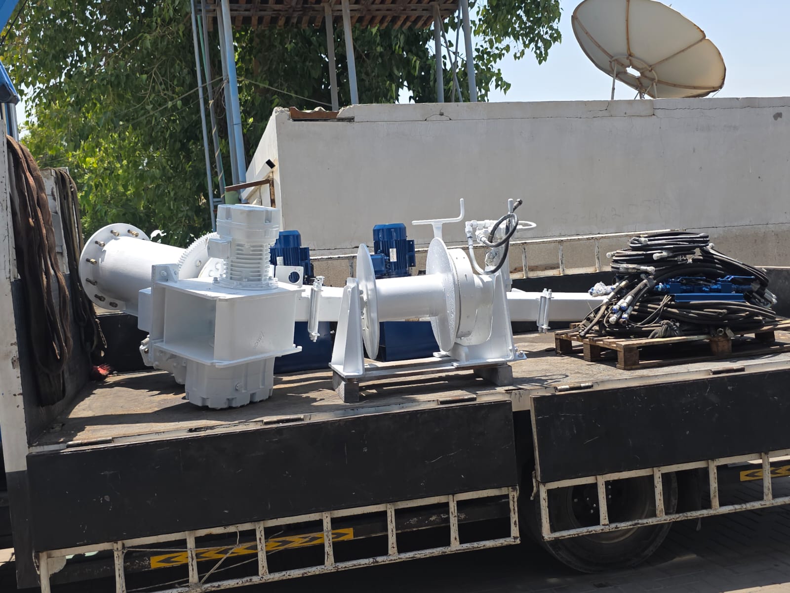 Overhauled crane winch and power pack loaded for return to vessel