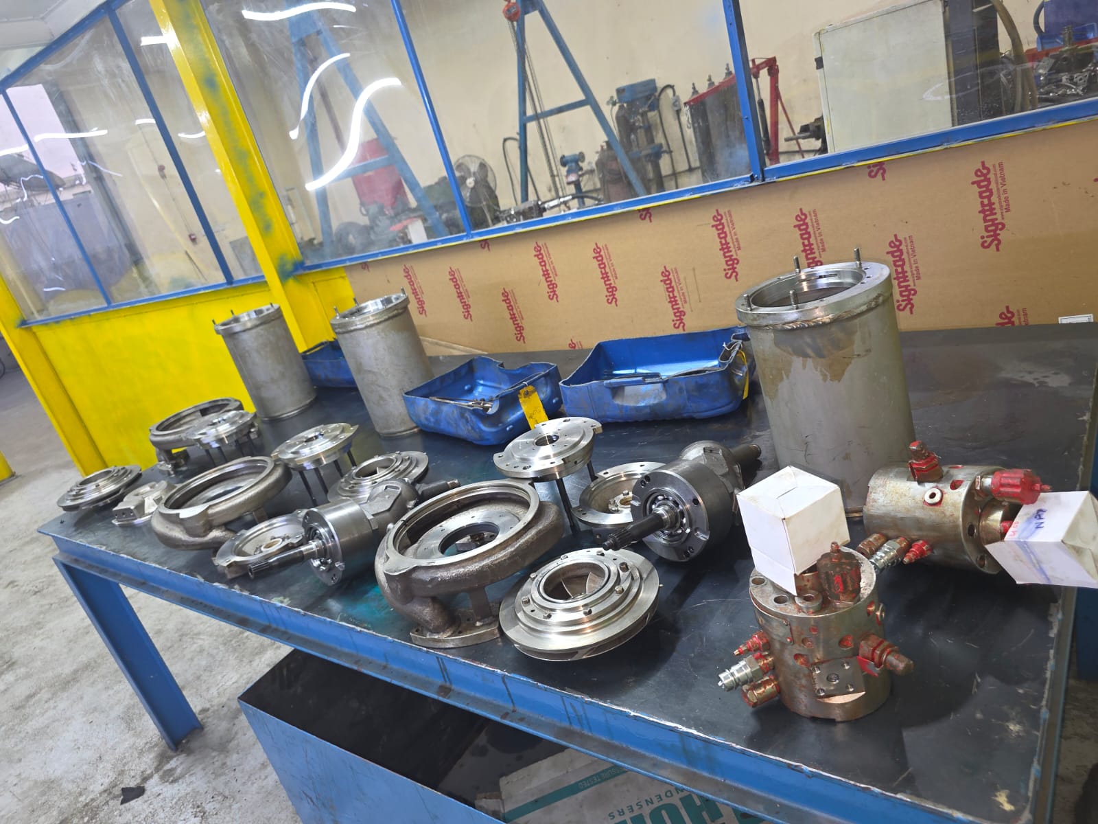 FRAMO pump components laid out on a workshop table