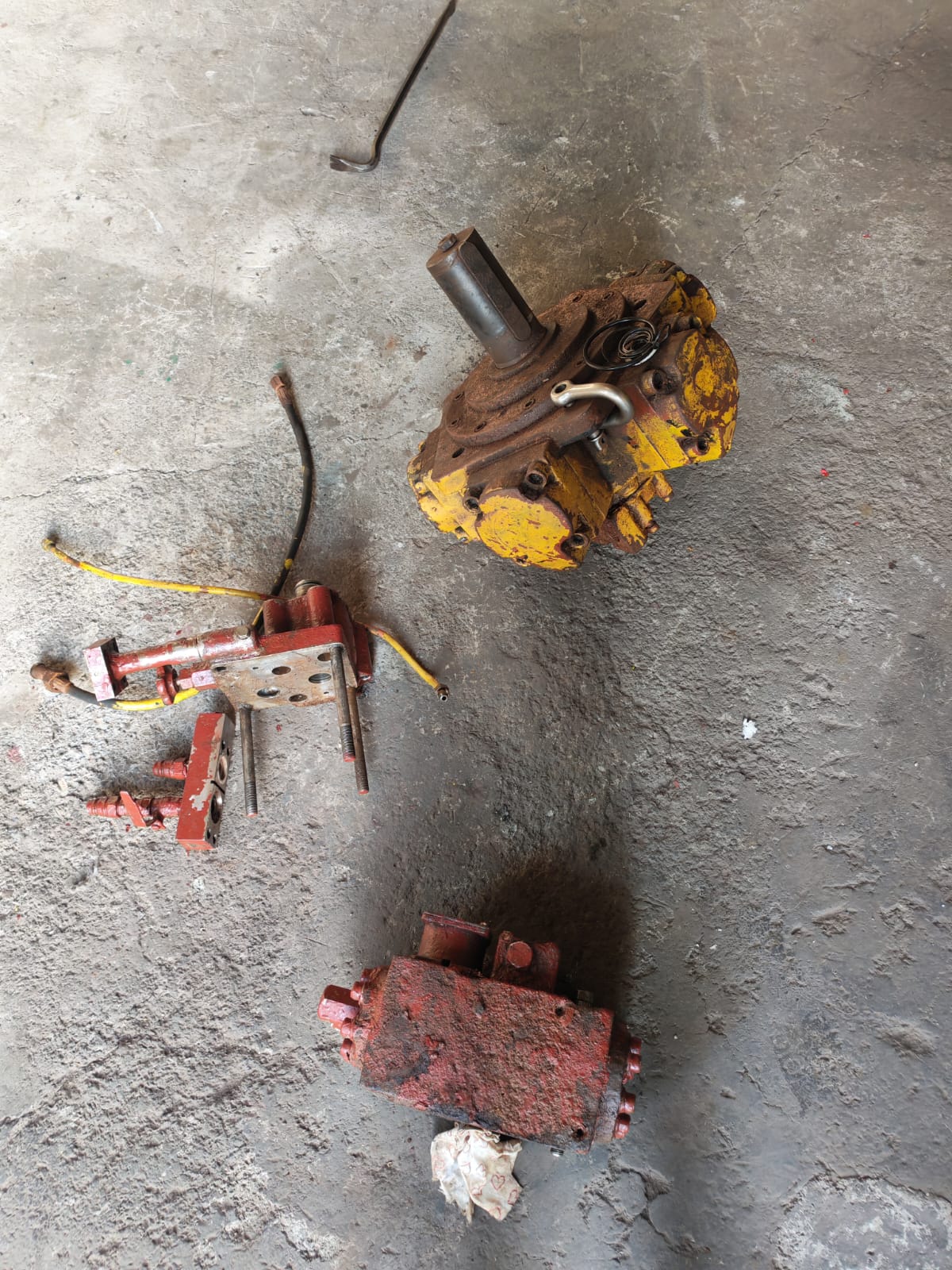 Windlass motor and FRAMO head valve components laid out at the workshop